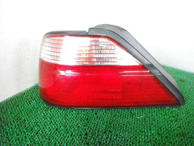 Left Tail Light NISSAN Gloria 1995 E-HY33 — photo 1