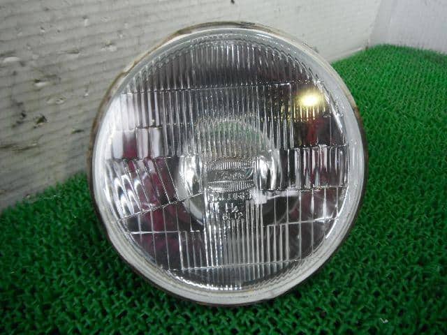 Right Headlight MITSUBISHI Pajero Jr 1995 E-H57A — photo 1