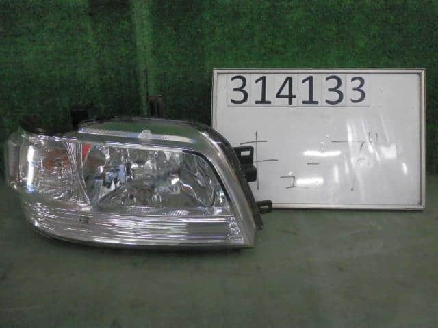 Right Headlight NISSAN Cube 2000 TA-ANZ10 — photo 1