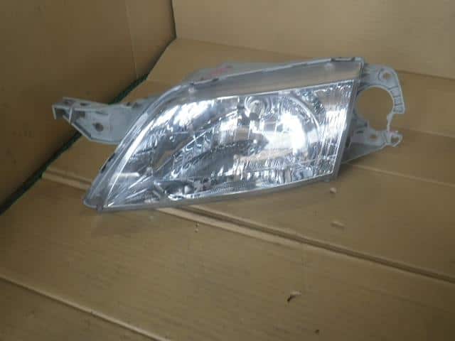 Left Headlight MAZDA Premacy 2000 GF-CP8W C100510L0C — photo 1