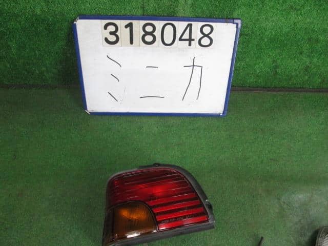 Left Tail Light MITSUBISHI Minica 1989 M-H26V — photo 1
