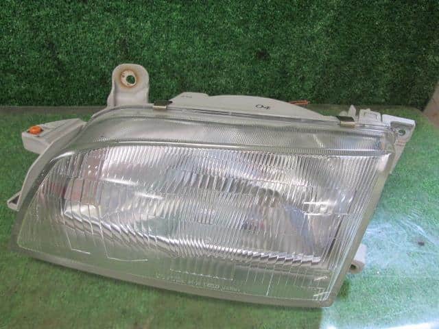 Left Headlight TOYOTA Caldina 1996 E-AT191G — photo 2