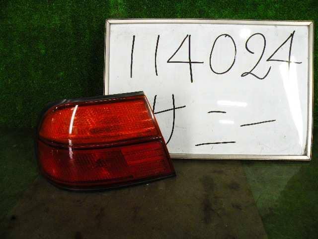 Left Tail Light NISSAN Sunny 1997 E-FNB14 — photo 1