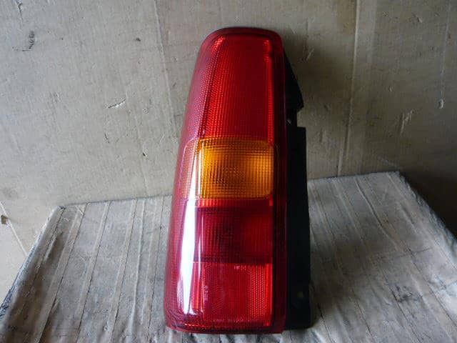 Left Tail Light MAZDA Az offroad 2000 TA-JM23W — photo 2