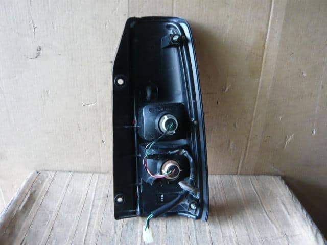 Left Tail Light MAZDA Az offroad 2000 TA-JM23W — photo 4