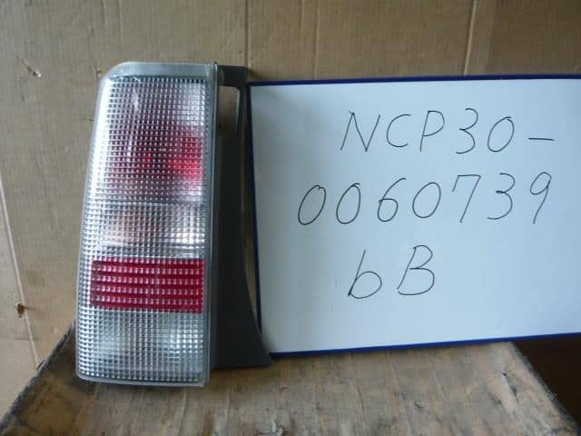 Left Tail Light TOYOTA bB 2003 UA-NCP30 — photo 1