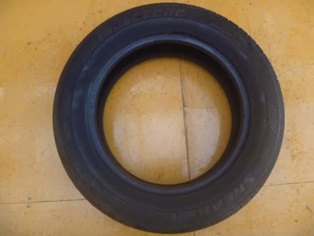 Tire MAZDA Familia 1994 E-BWFY10 — photo 1