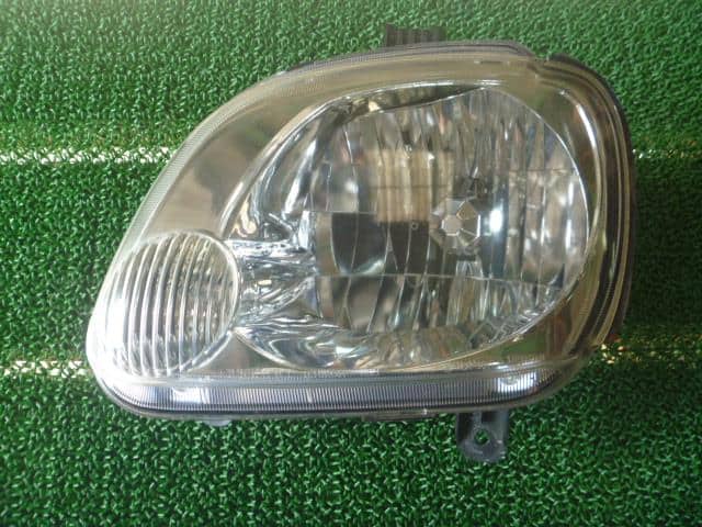 Left Headlight SUBARU Pleo 2006 TA-RA1 — photo 1