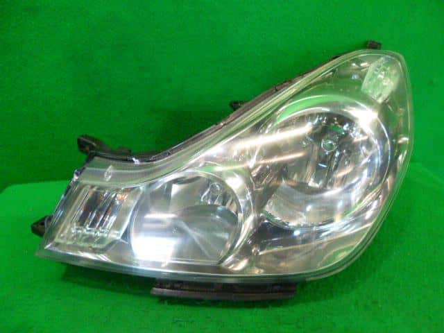 Left Headlight NISSAN Wingroad 2006 DBA-Y12 — photo 1