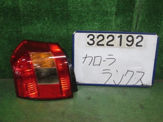 Left Tail Light TOYOTA Corolla Runx 2001 TA-NZE124 — photo 1