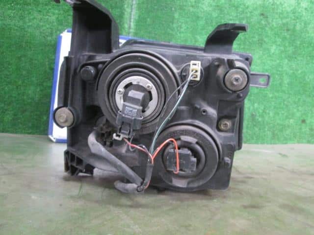 Left Headlight MITSUBISHI eK Sport 2002 LA-H81W — photo 3