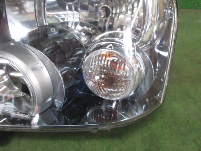 Left Headlight MITSUBISHI eK Sport 2002 LA-H81W — photo 2