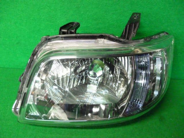 Left Headlight HONDA Zest 2006 DBA-JE1 33151SYAJ21 — photo 1