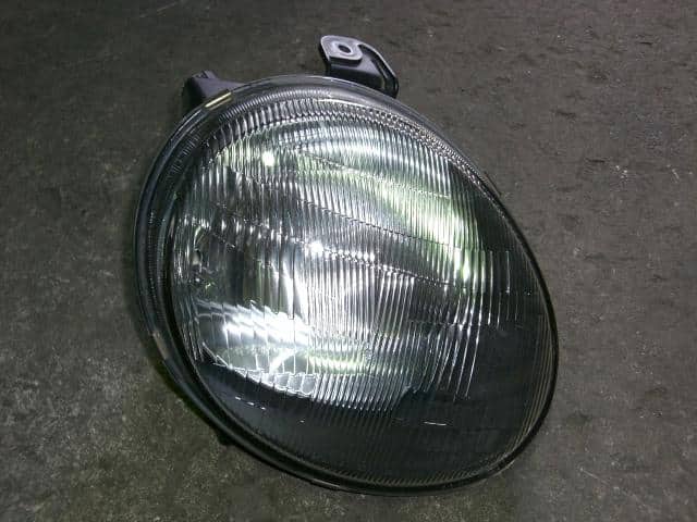 Right Headlight MITSUBISHI Minica 1994 E-H36A — photo 1