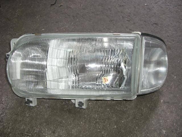 Left Headlight NISSAN Serena 1995 E-KBNC23 B60603C000 — photo 1