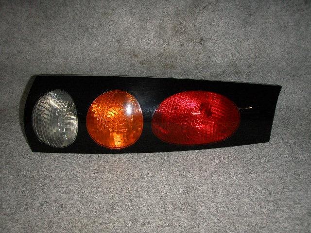 Left Tail Light TOYOTA Raum 1998 GF-EXZ10 — photo 1