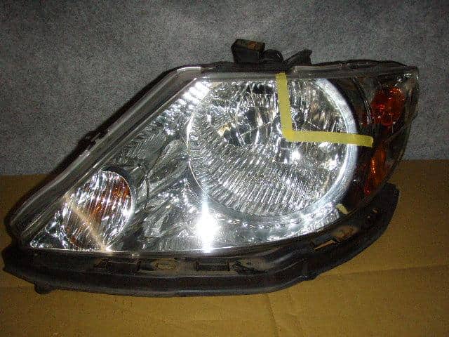 Left Headlight HONDA Fit Aria 2003 LA-GD8 — photo 1