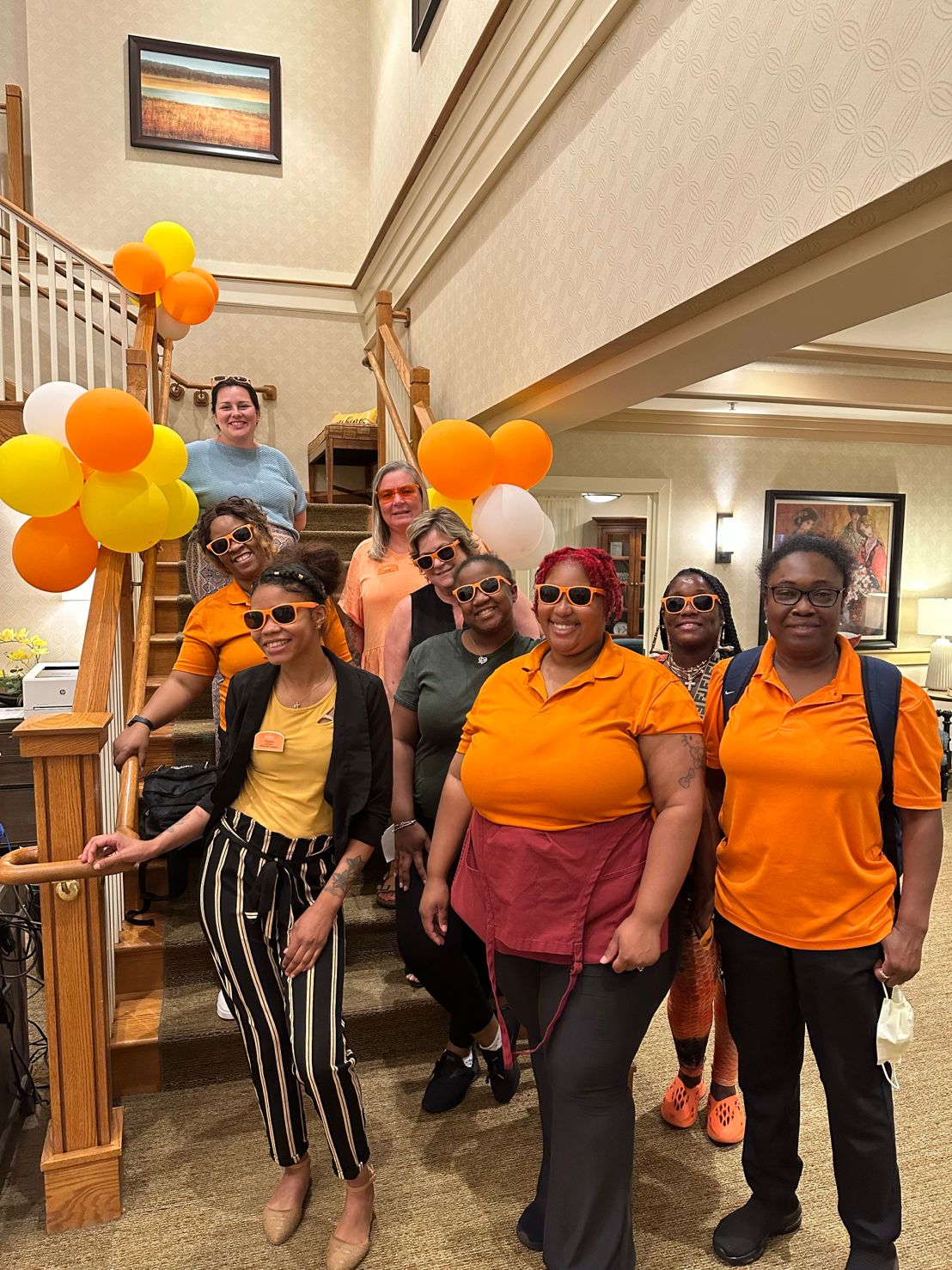 Sunrise team members showing their team pride.