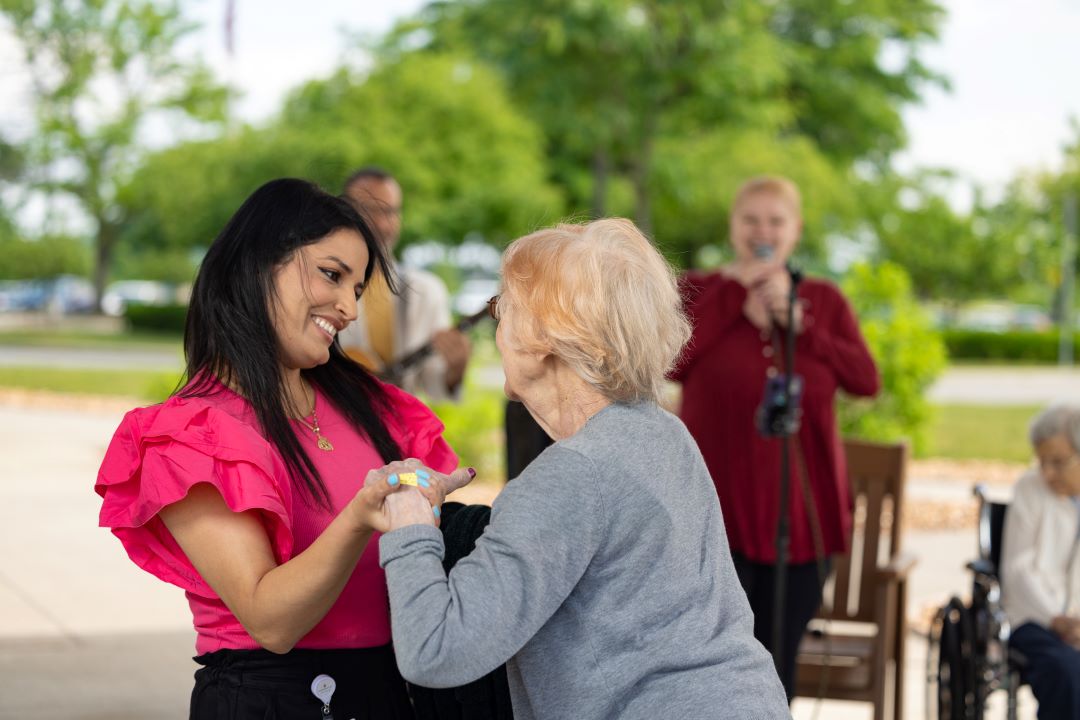 Employees enjoy music therapy programs almost as much as our residents.