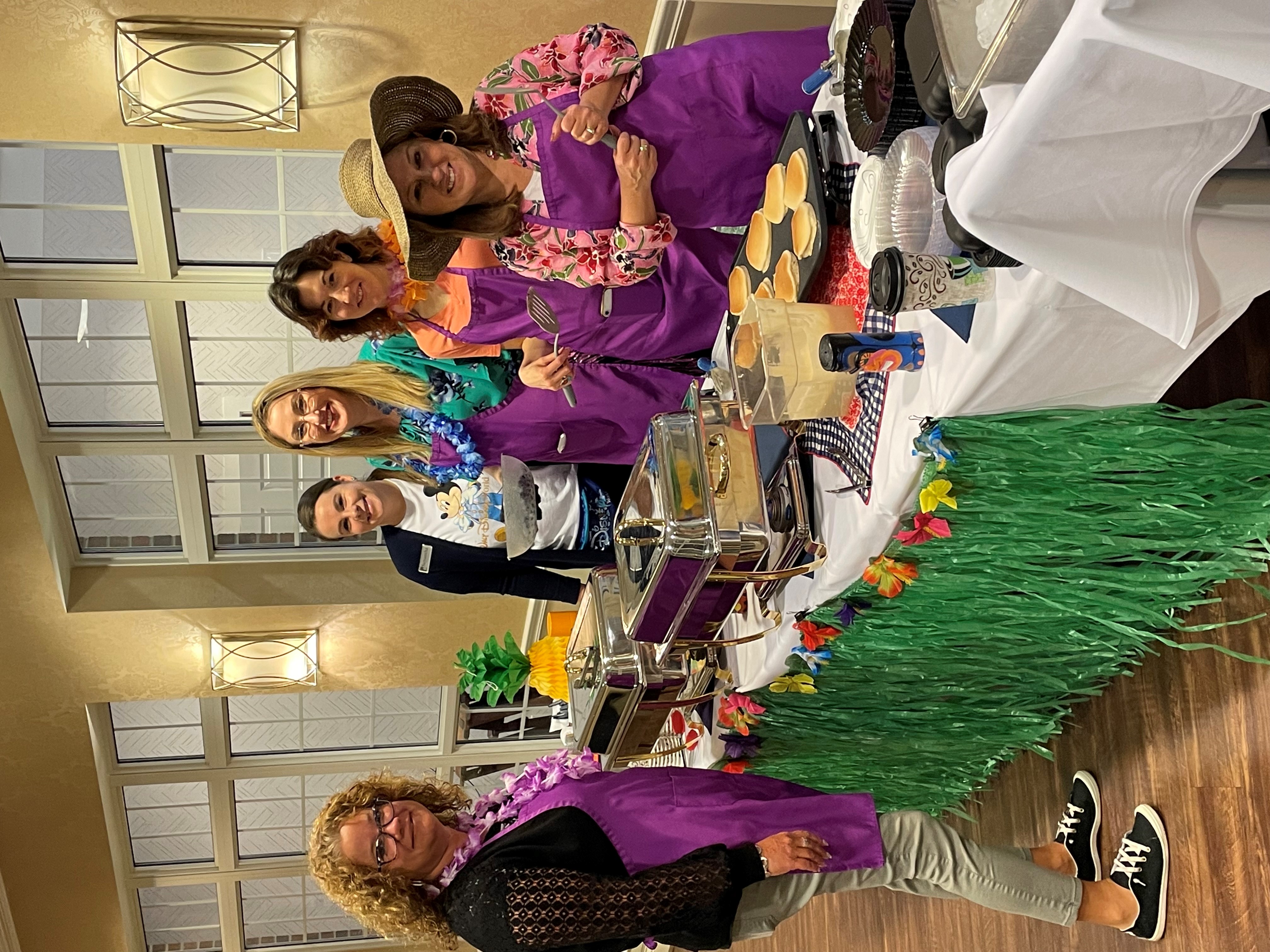 Leadership making pancakes for staff at our "Spring Break for Breakfast" Event!