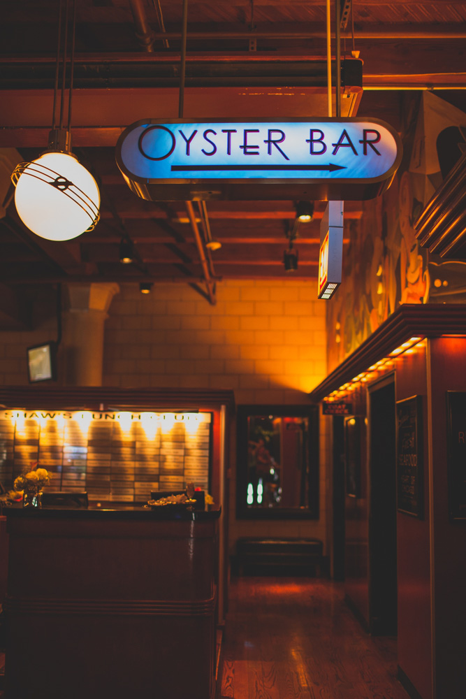 sign in restaurant that points and says Oyster Bar