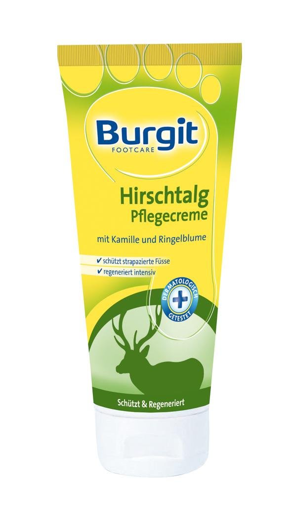 Tube mit Burgit Hirsch­tag Pflege­creme, gelbe Verpackung, mit Angaben zu Inhaltsstoffen wie Kamille und Ringelblume.
