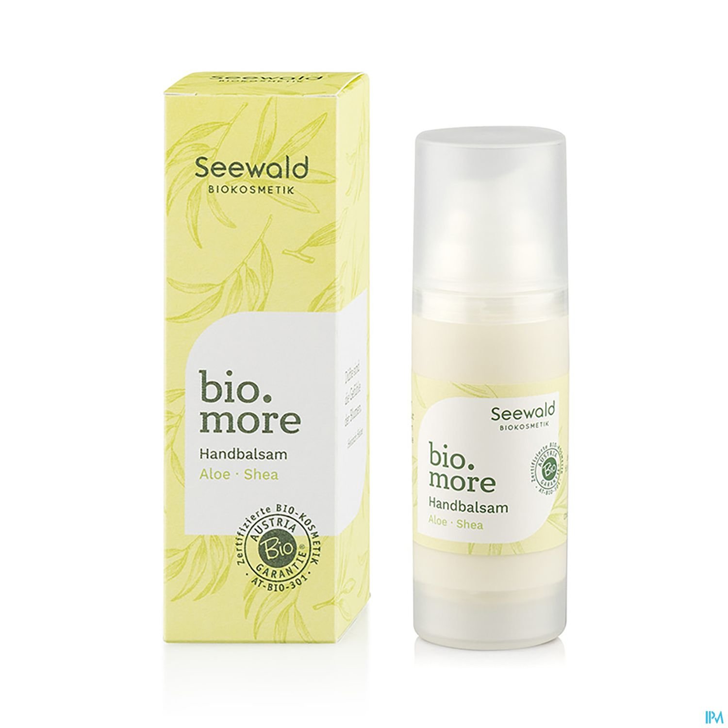Handbalsam in einer Flasche mit Pumpspender, umgeben von einer gelben Verpackung mit Pflanzenmotiven, beschriftet mit "bio.more Handbalsam Aloe - Shea" und dem Logo von Seewald Biokosmetik.