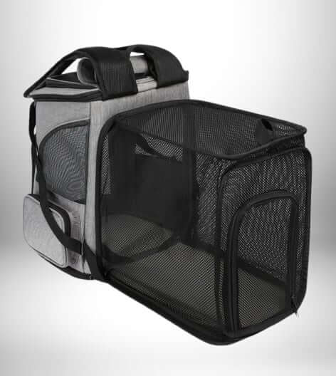 Voici une description de l'image :
Sac a dos transport chat avec un compartiment extensible grillagé. Le sac est gris et noir.