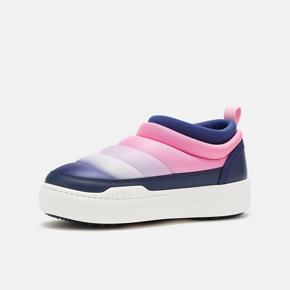 The same pink and navy slip-on shoe shown from a three-quarter angle on a gray background