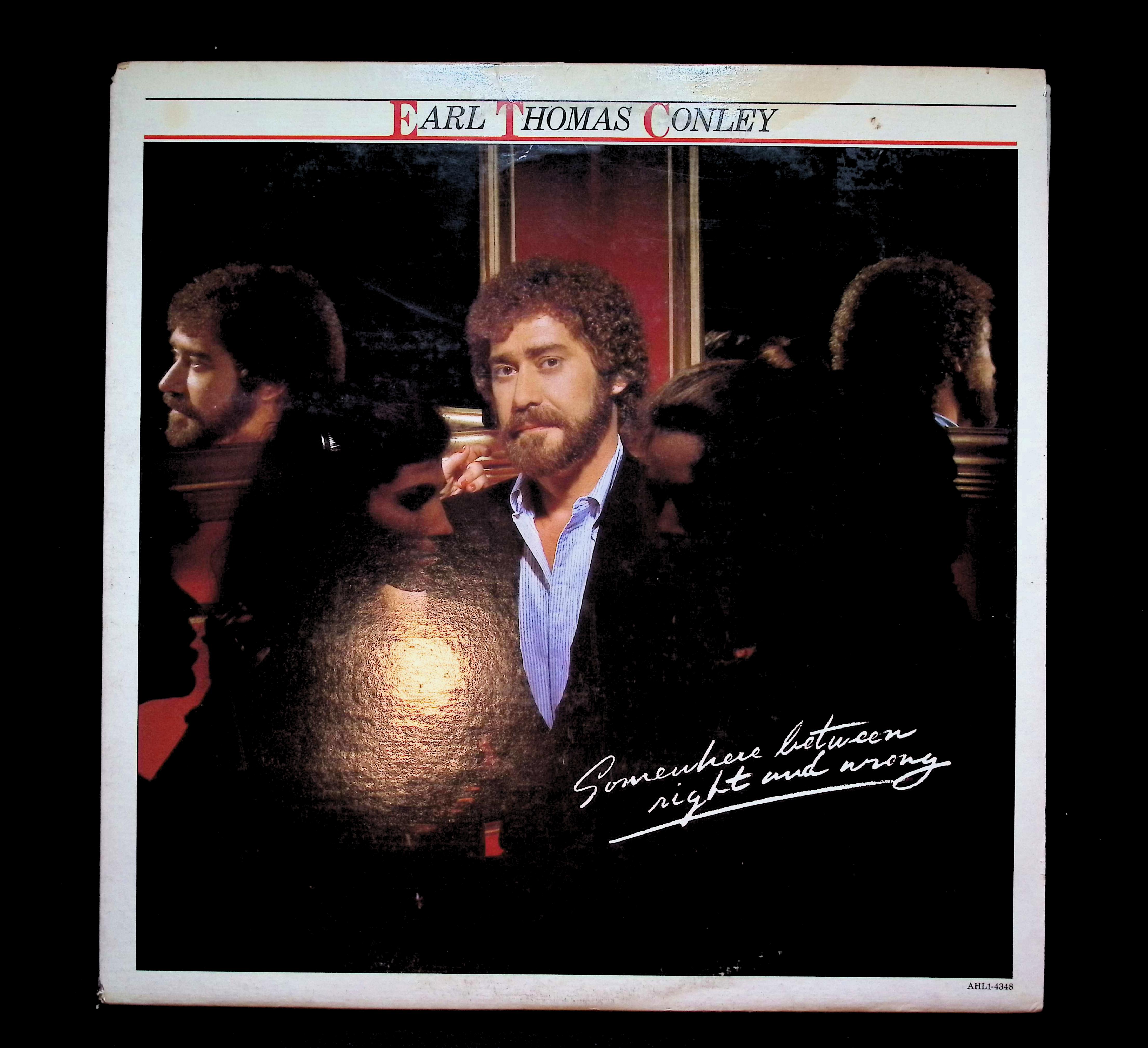 Earl Thomas Conley Somewhere Between RIght And Wrong 12" LP 1982 AHL1-4348 Folk, World, & Country