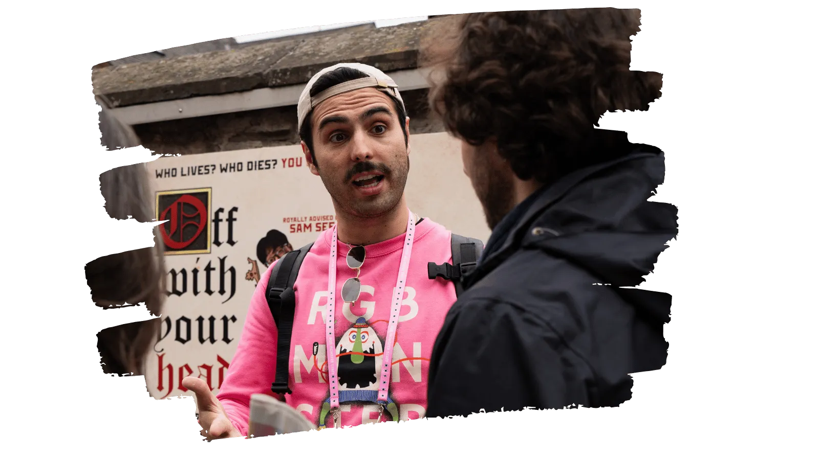 A person handing out flyers to passers-by