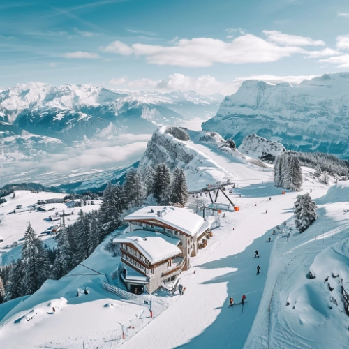 a ski resort in switzerland at the top of a mountain with an amazing view