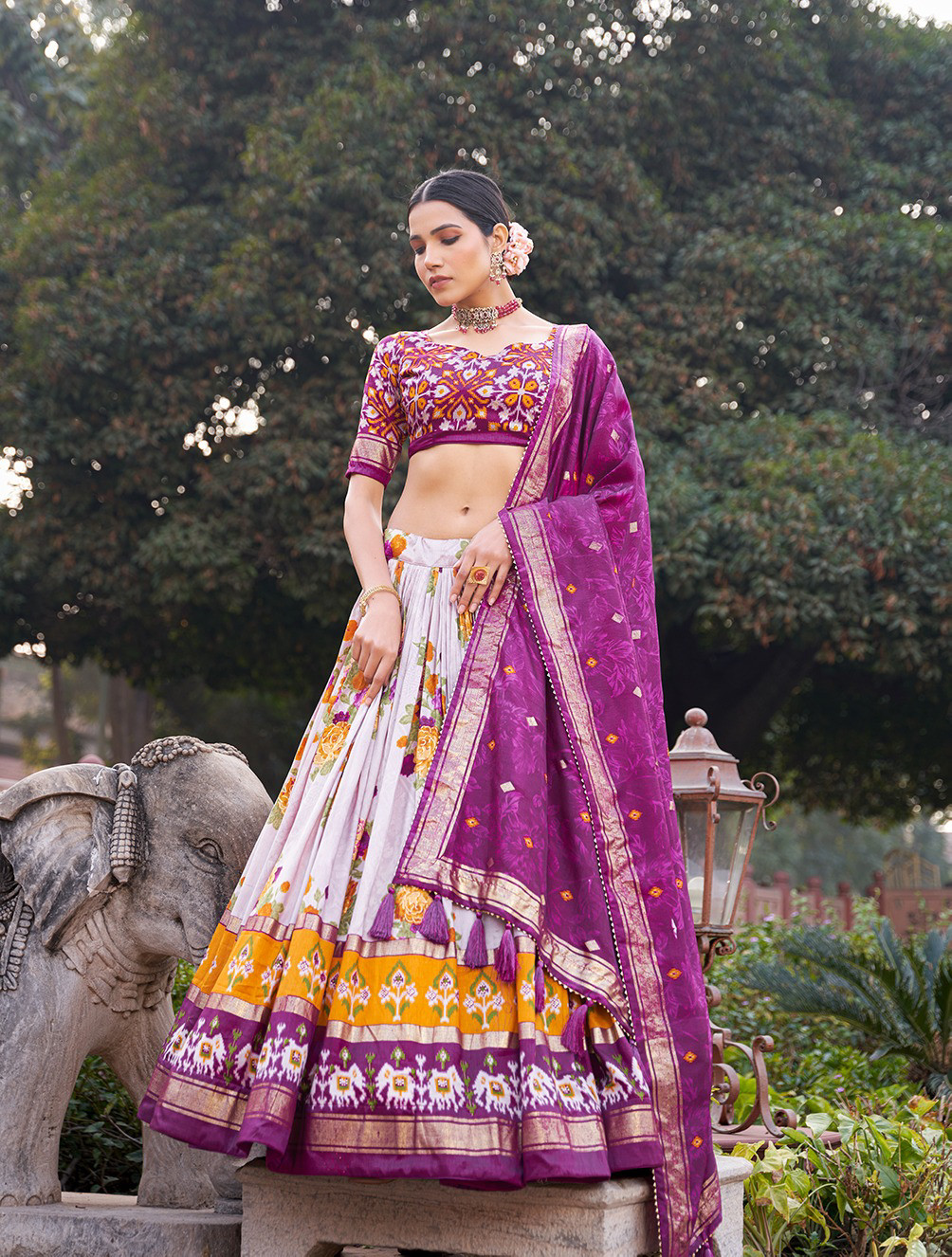 Antique Fashion  Embrace elegance with every twirl Dive into the enchanting world of florals with our mesmerizing Dola silk lehenga choli - wine