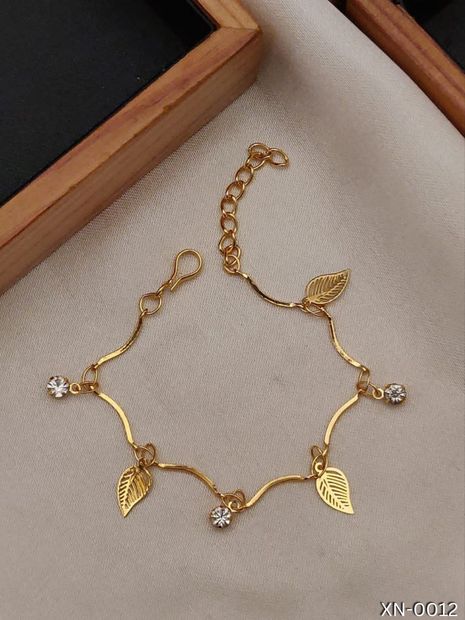 KANAF RegalRadiance Gold-Plated Adjustable Bracelet with Exquisite Long Leaf Pattern, Intricately Adorned with Sparkling Cubic Zirconia and American Diamond Accents for Timeless Elegance