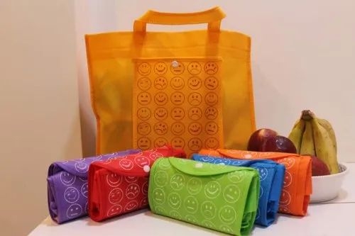 Folding Smiley Bags with Button and Good Material and Stitching