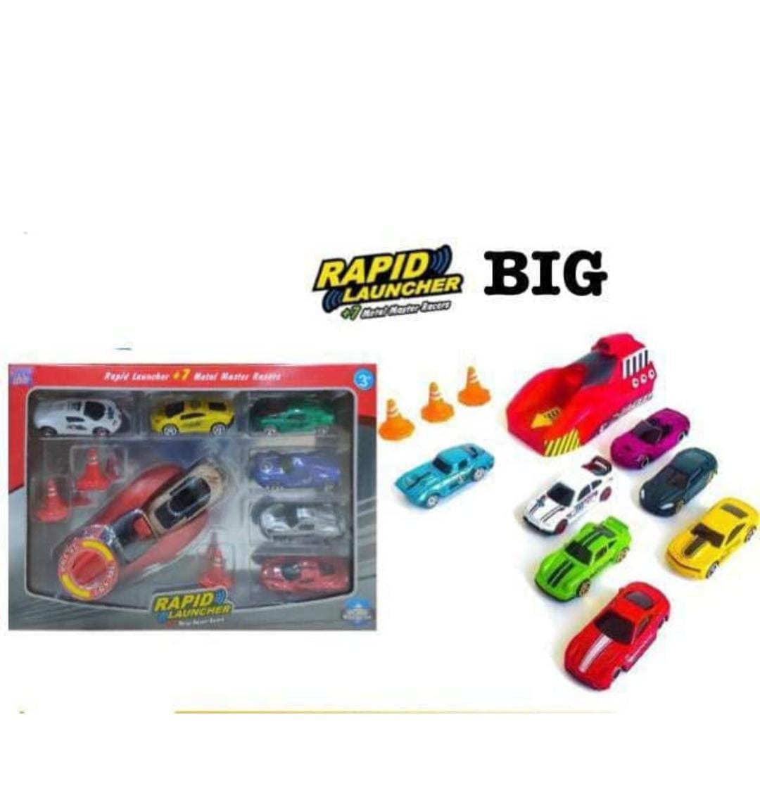 Rapid car launcher  With 4 metal die cast cars   And other traffic props   Real picture attached