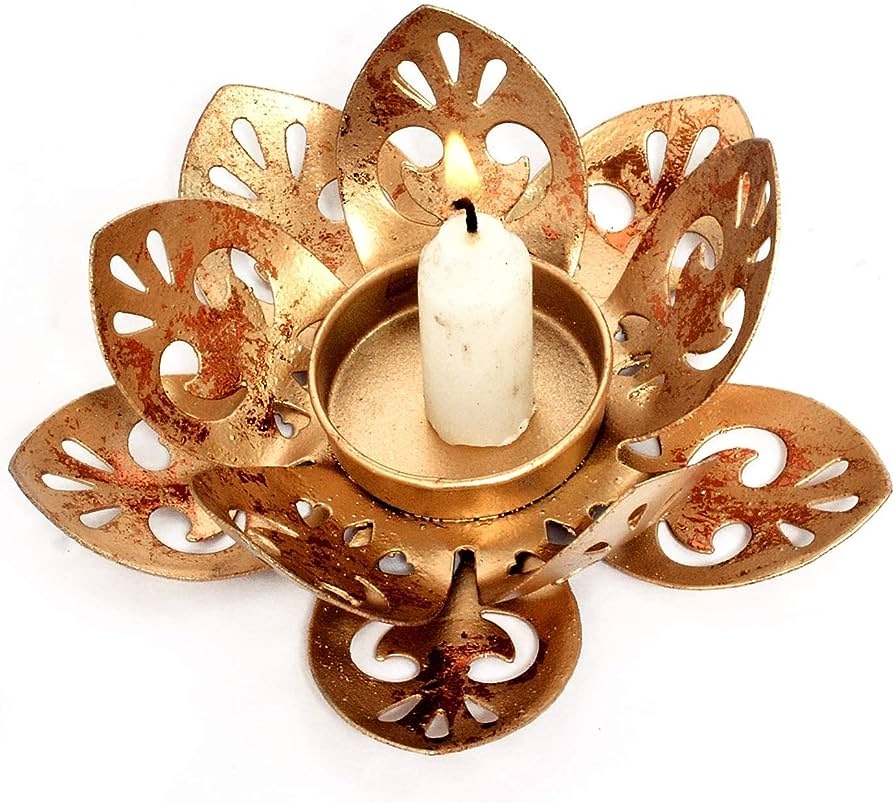 Metal tealight holder Available in plain and jali design Size 6-7 inches