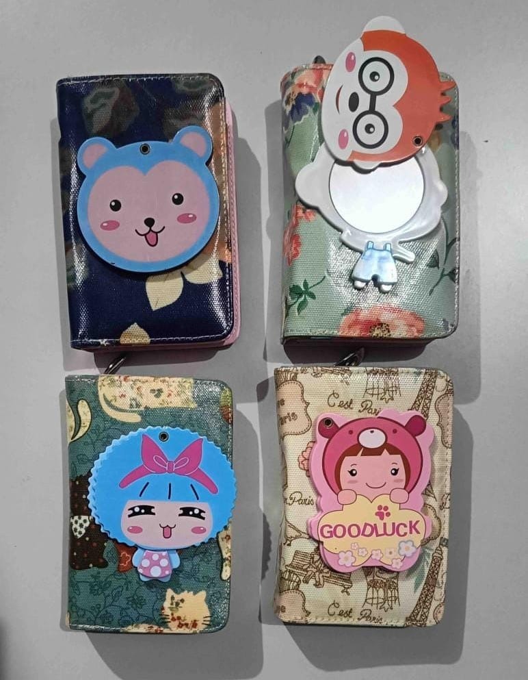 Kids wallet with openable cartoon mirror on top. Color random only