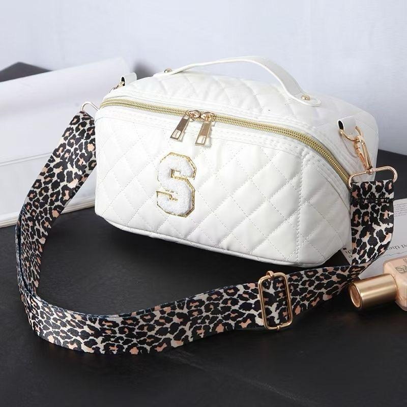 PU LEATHER SLING/MAKEUP POUCH WITH SLING STRAP.Premium quality. Color random only Real pic shared