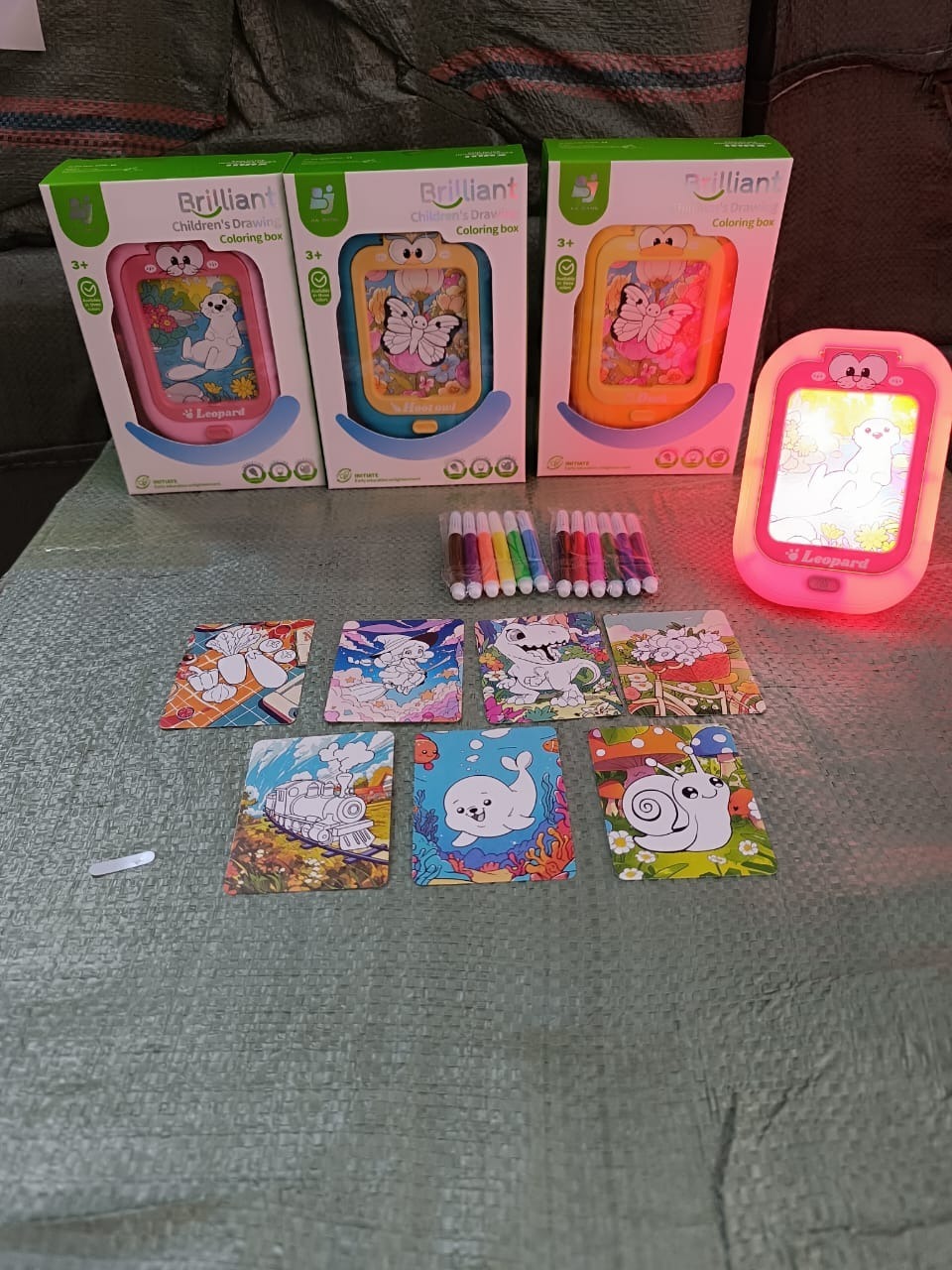 Drawing coloring pad with light.Color random only girl or boy choice possible