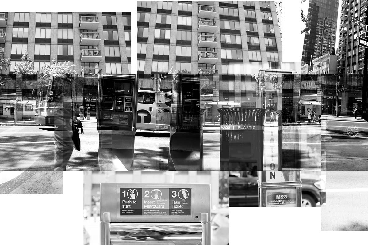 A black and white artistic photo of buildings and sidewalks and curbs