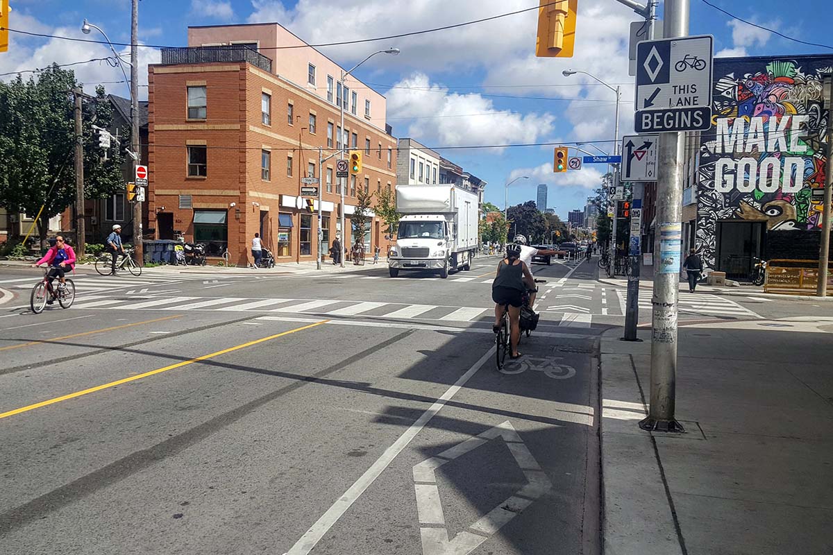 A stretch of Bloor Street in Toronto with a bike lane