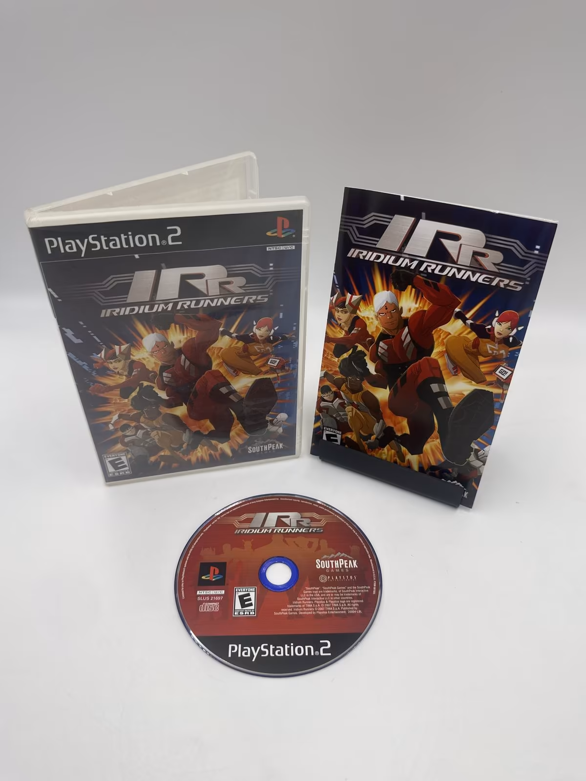 Iridium Runners - PS2 - Mídia Física - Seminovo Completo
