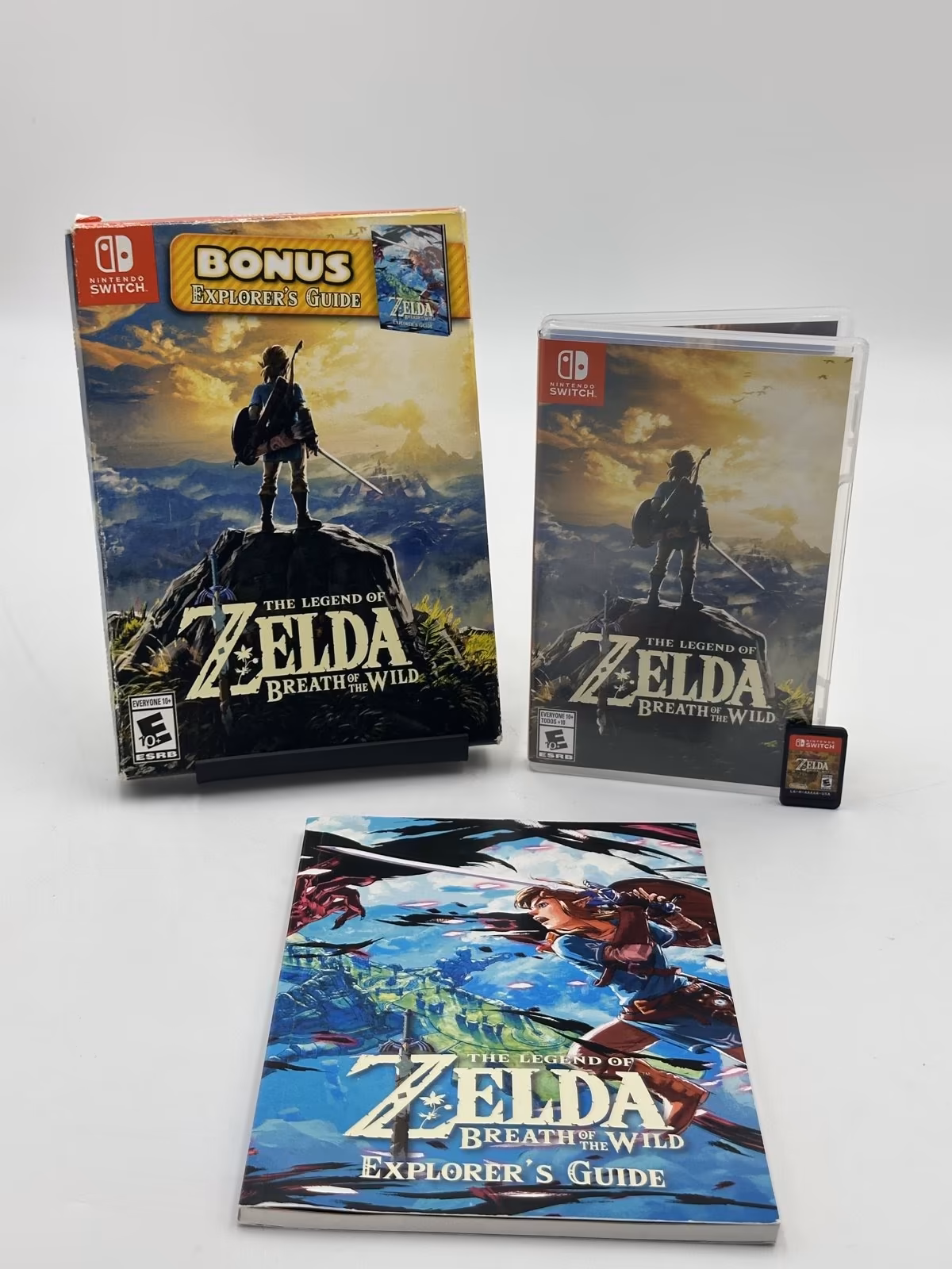 The Legend of Zelda: Breath of the Wild - com Explorer's Guide - Seminovo Completo, SWITCH, foto real 2 de 5
