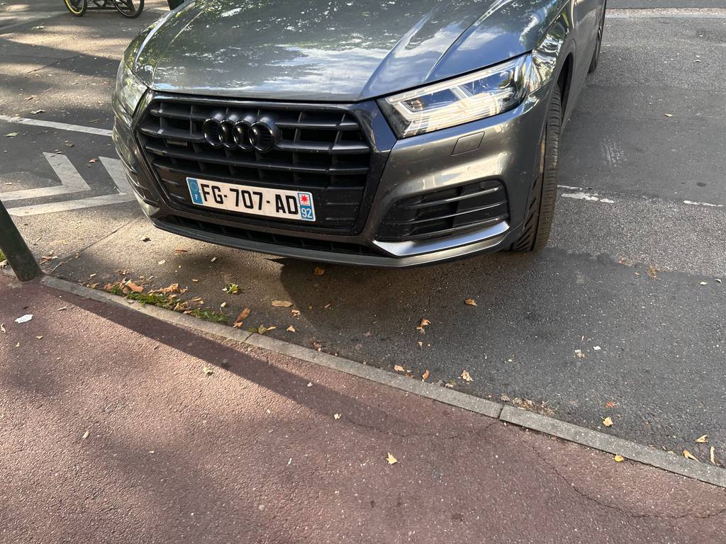 Stationnement illégal devant garage - signe.