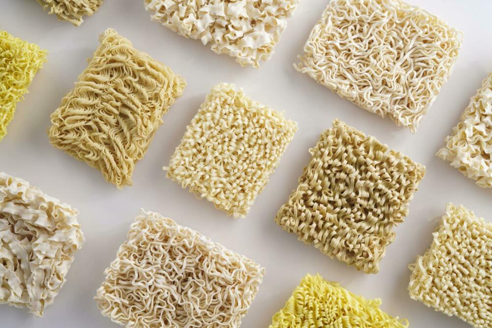 Assorted ramen noodle blocks showing different shapes and drying styles.