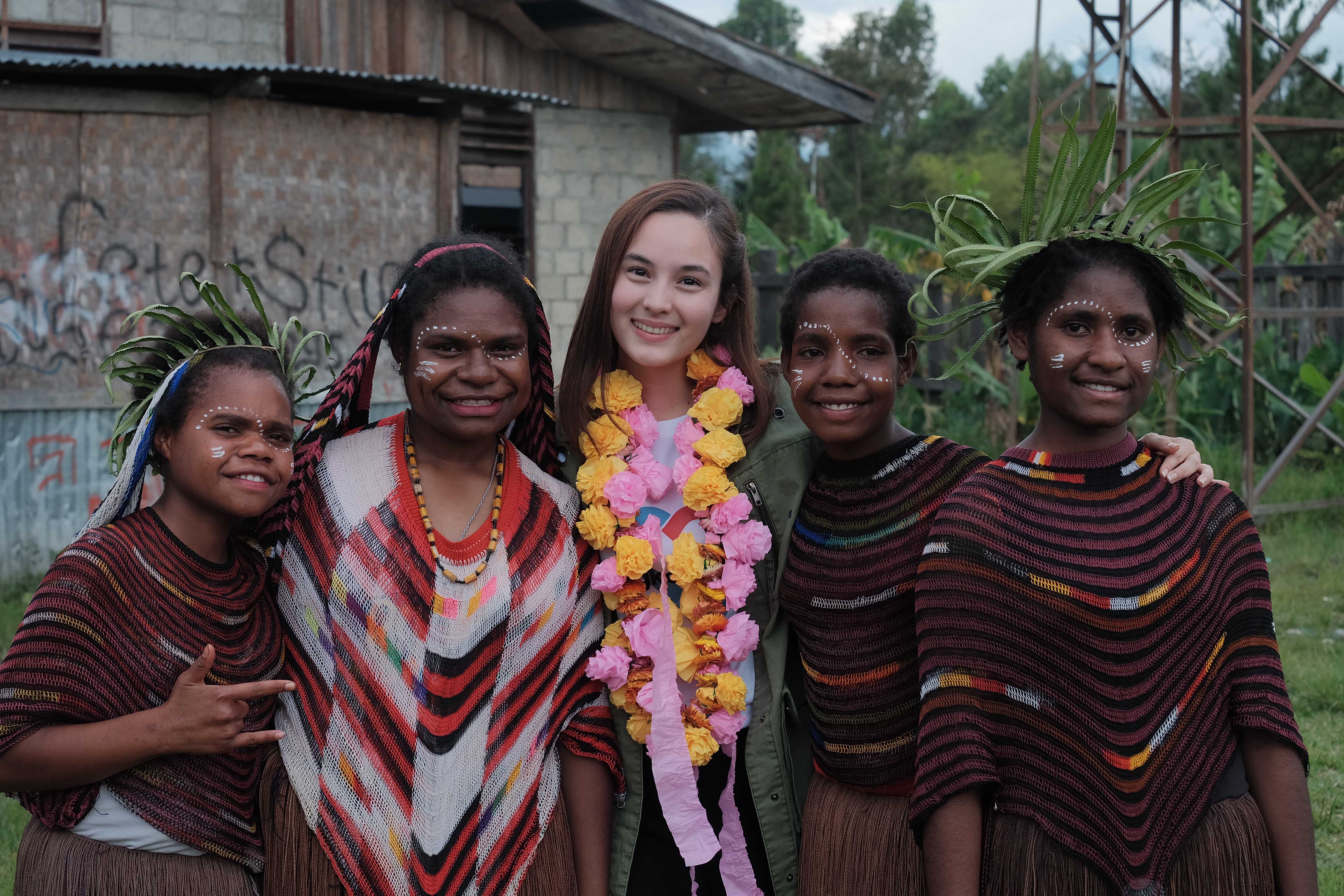 this is april x chelsea islan goes to papua wearing noken