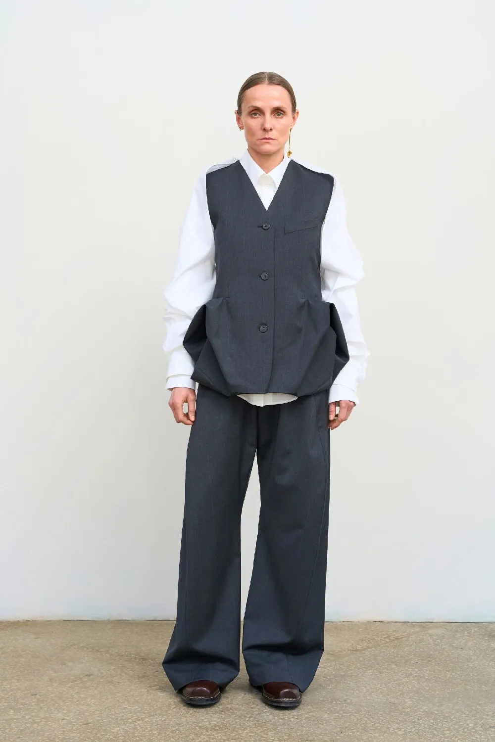 TAILORED VEST WITH FLORAL ACCENTS