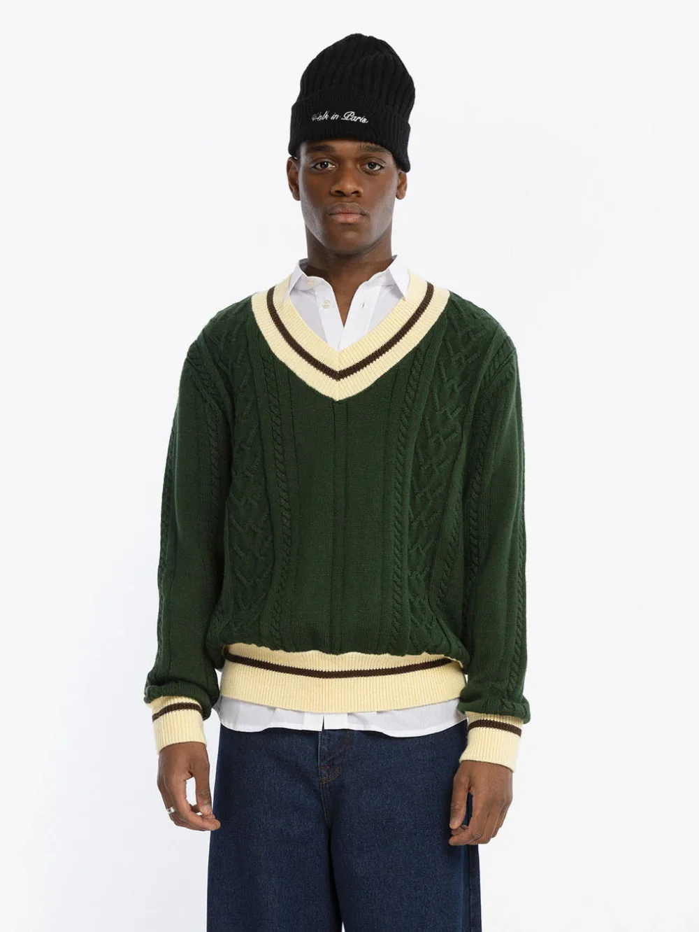 Le pull en maille vert