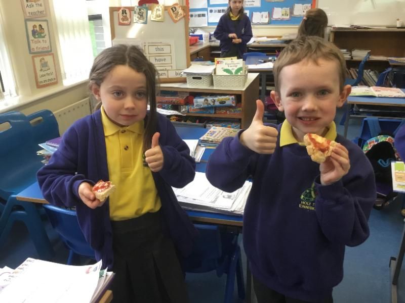 Bread making in P3: Eating yummy warm school made bread with butter and jam.